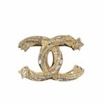 Chanel Cc Brooch Gold With Stones Attached And Two Stars