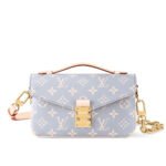 Louis Vuitton Pochette Métis East West Coated Canvas Trianon 21Cm M12429