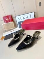 Valentino Garavani Rockstud Asymmetric Patent Leather Mules Black - Image 8
